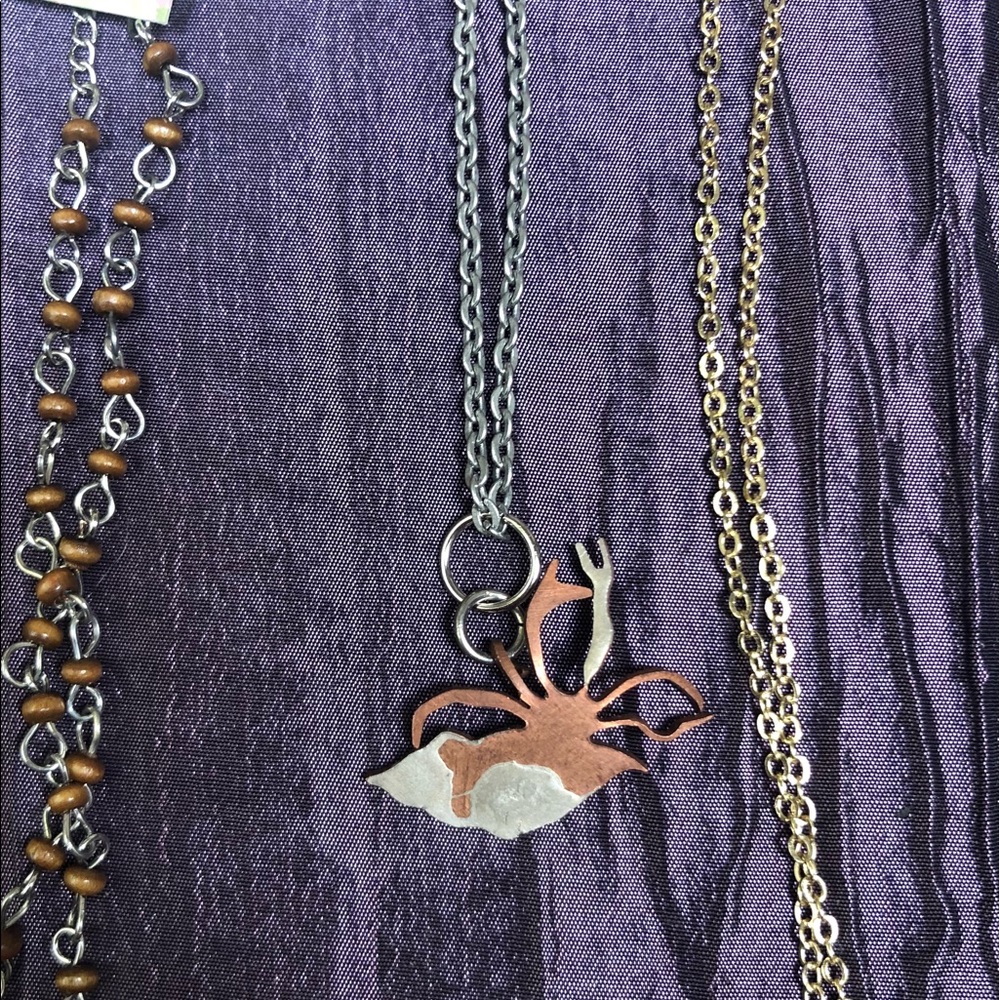 Hand carved crab necklace